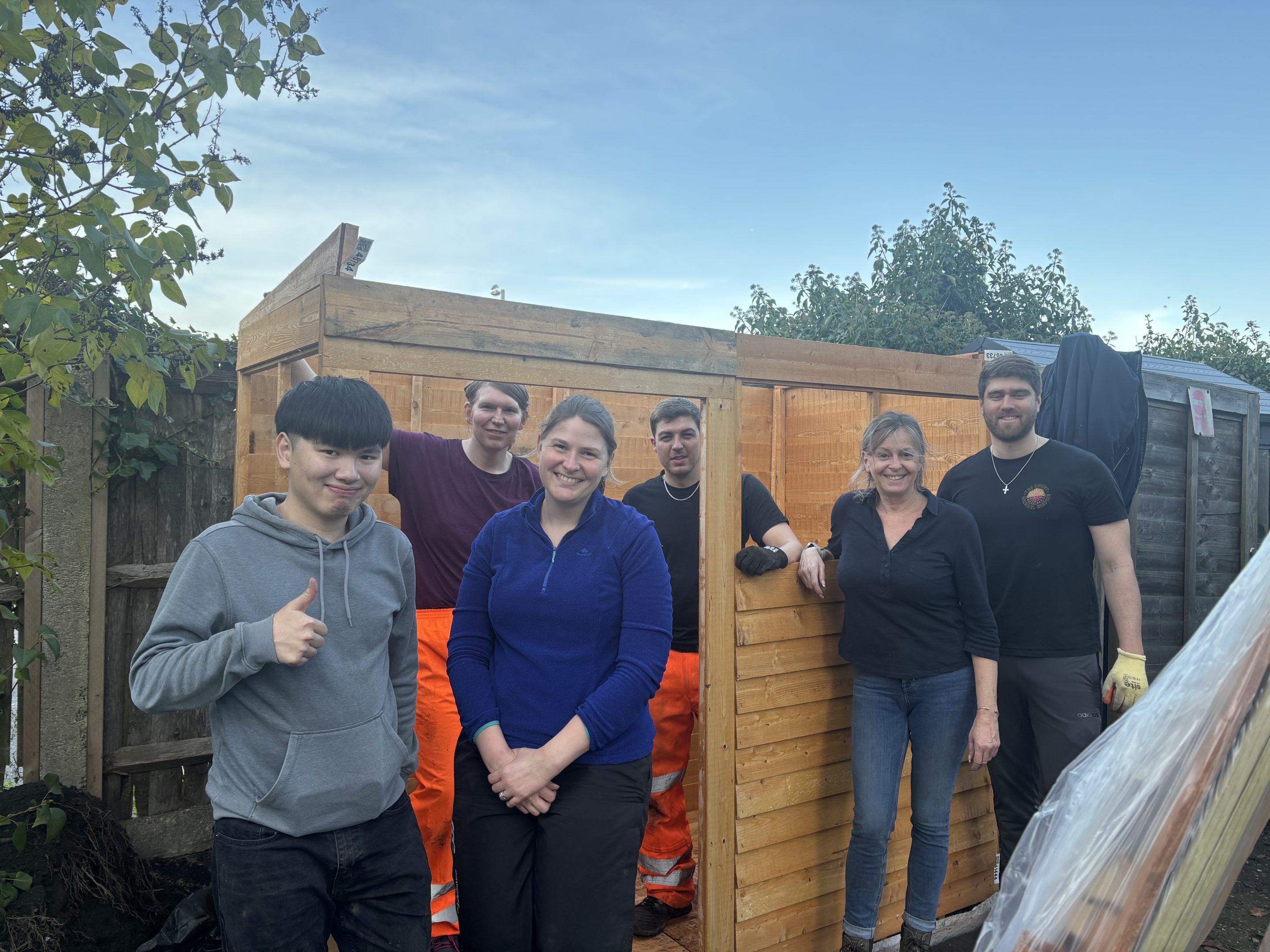 Image showing corporate volunteering, people building a shed